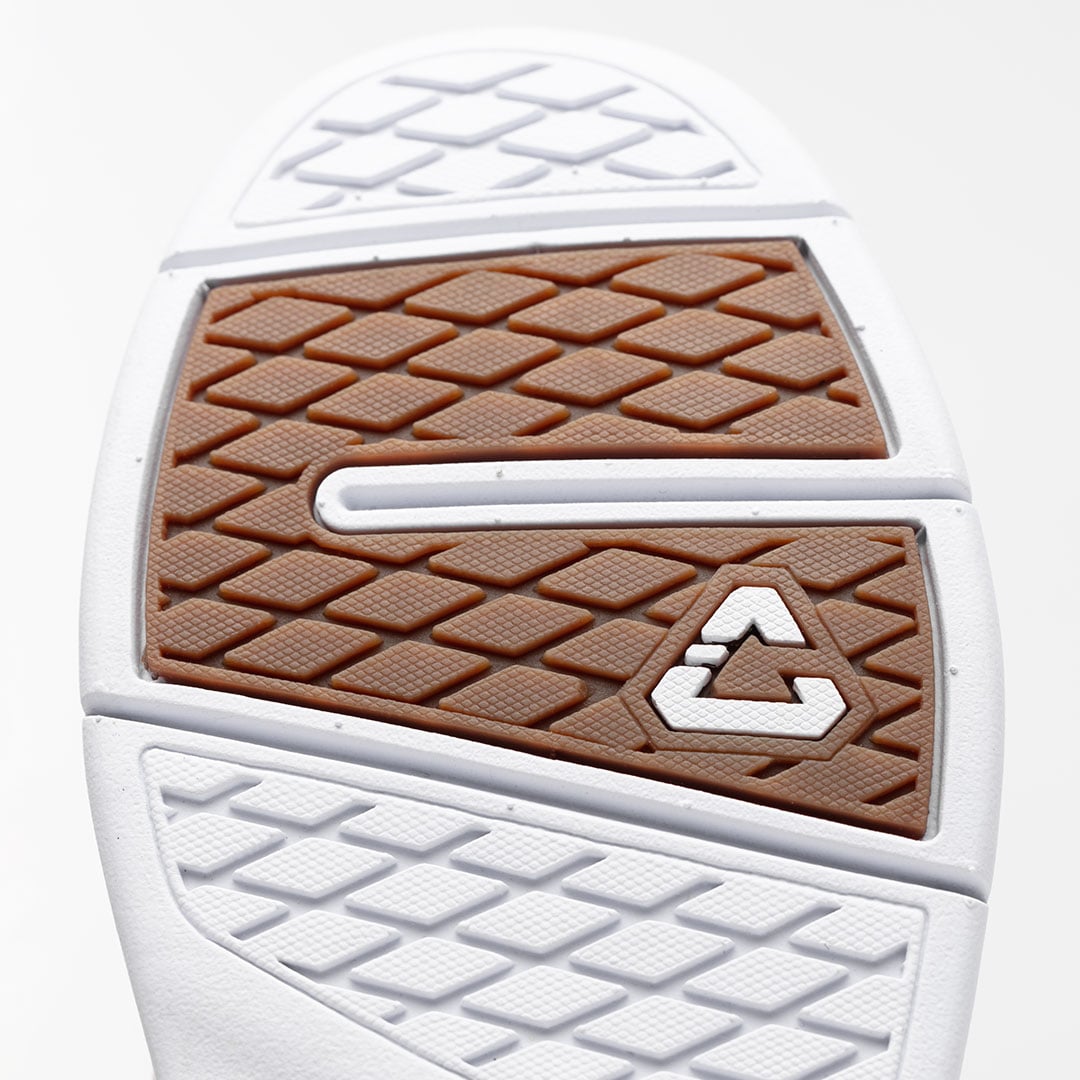 RUBBER INSERTS ON OUTSOLE FOR TRACTION