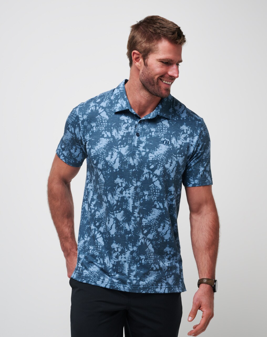 TravisMathew Men s Featherweight Pineapple Please Polo Shirt