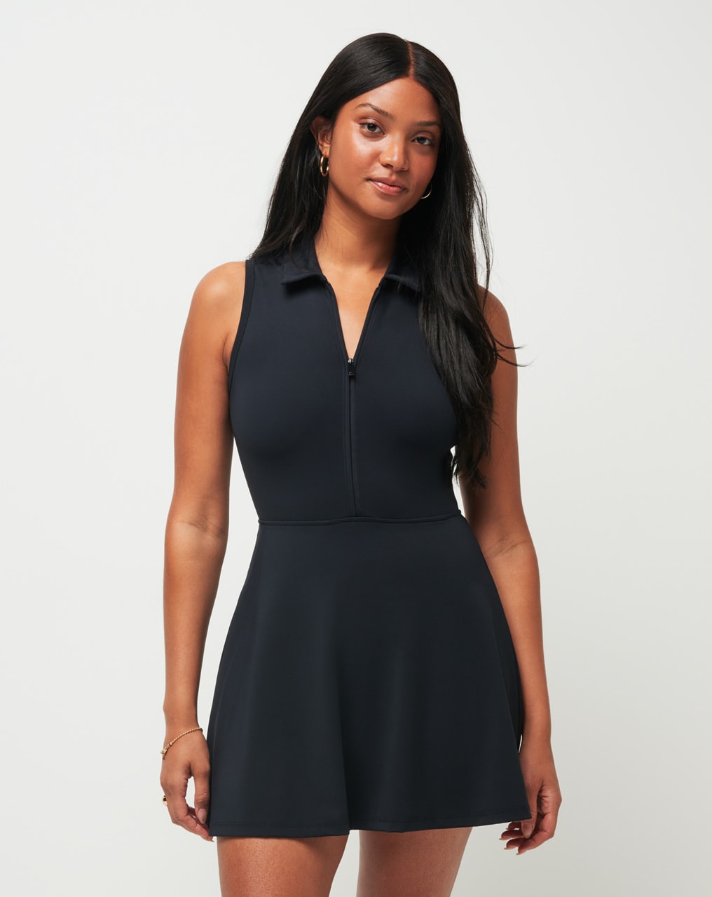 MOVEKNIT SLEEVELESS POLO DRESS TravisMathew